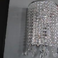 クリスタルビーズの壁付けコード式照明